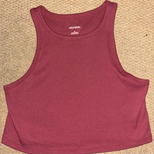 A magenta ‘wild fable.’ tank top. It was made in Indonesia. It’s a size XL.